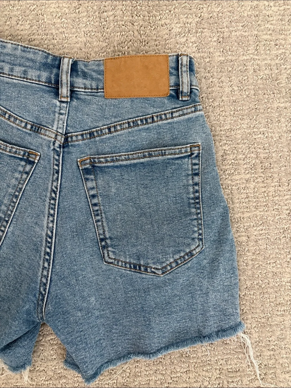 H&M Light Blue High-Rise Raw Hem Denim Shorts